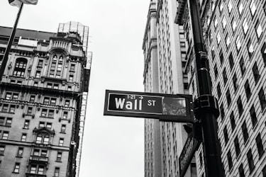 grayscale photo of 1-21 Wall street signage