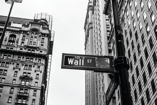 grayscale photo of 1-21 Wall street signage