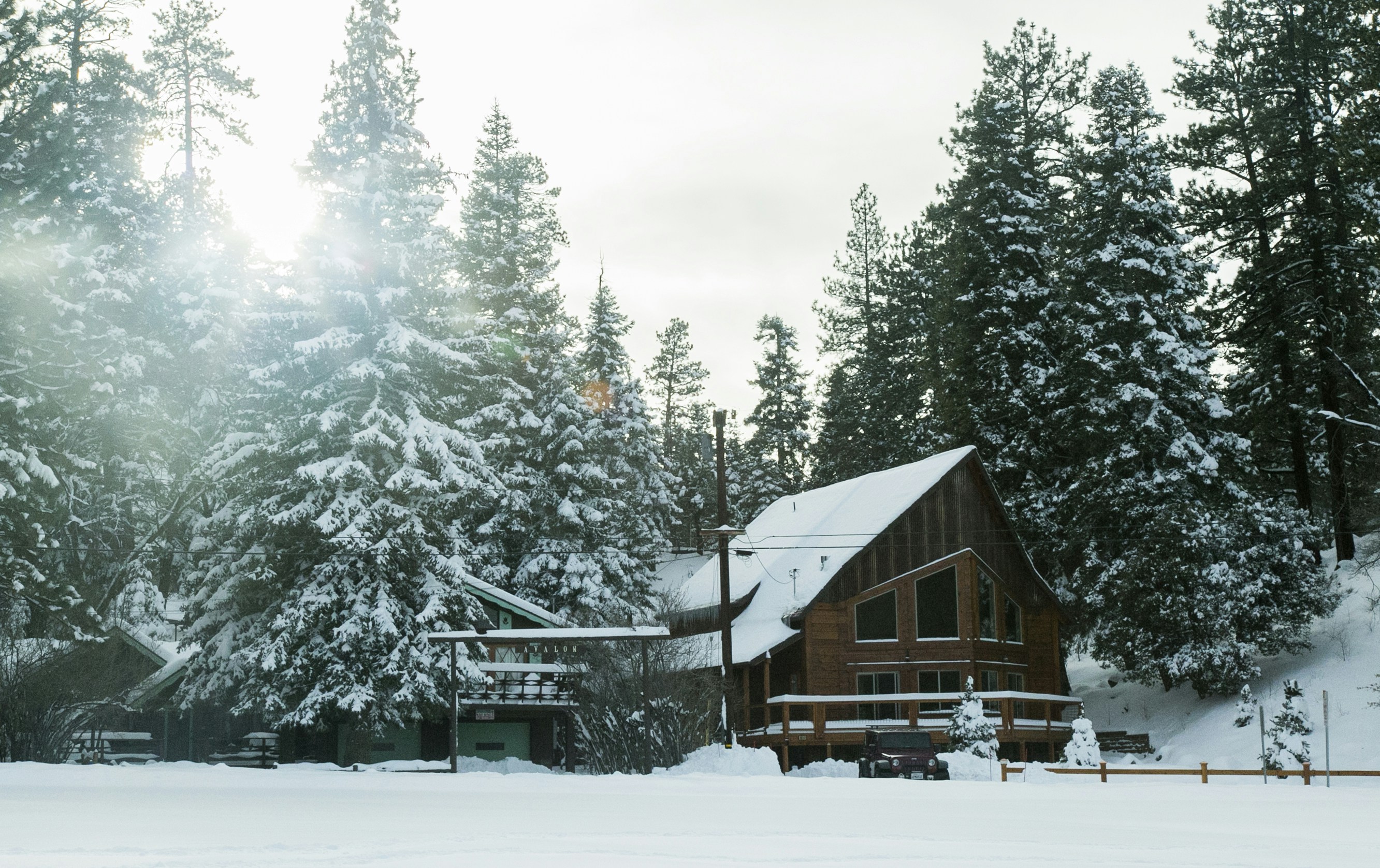 architectural photography of brown house, Winter cabin in California
