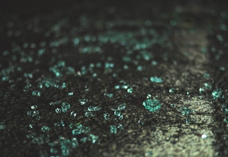 a close up of water droplets on a surface