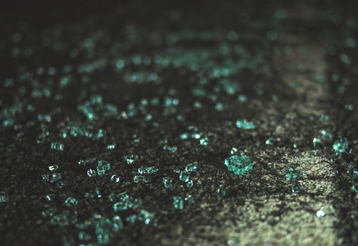 a close up of water droplets on a surface