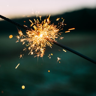 shallow focus photography of sparkler