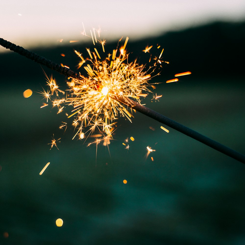 shallow focus photography of sparkler
