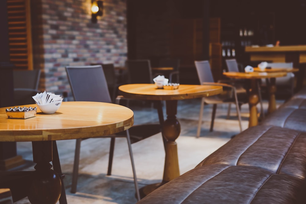 photography of brown pedestal table