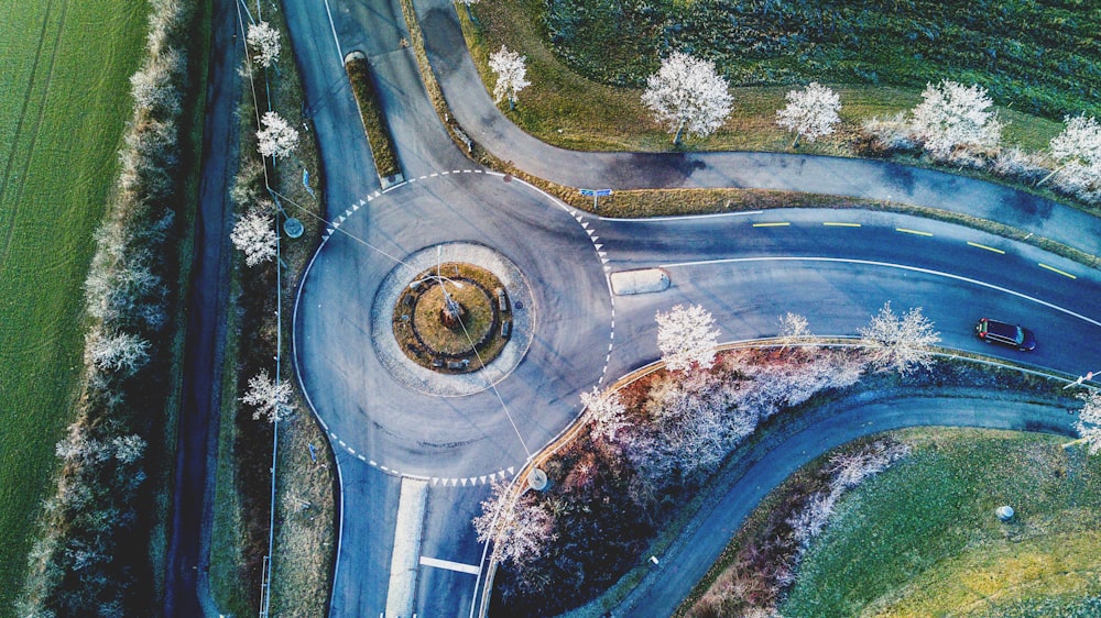 aerial photography of vehicle cross road