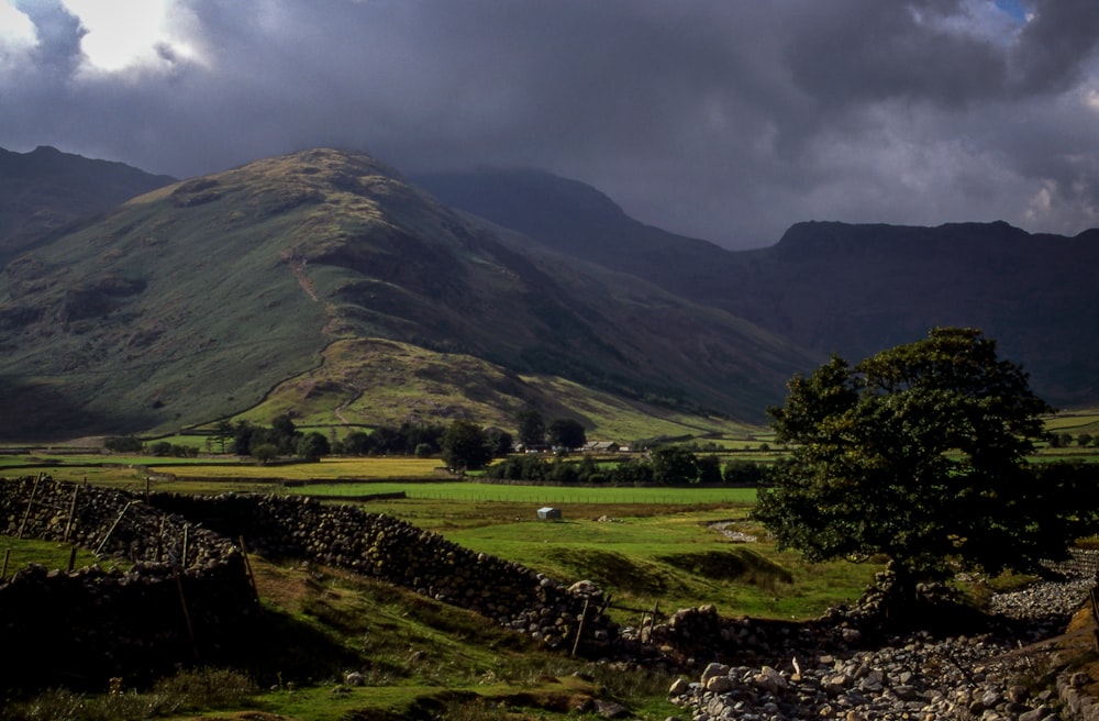 landscape photography of green and brown mountains