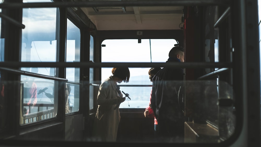 woman and man inside cable car