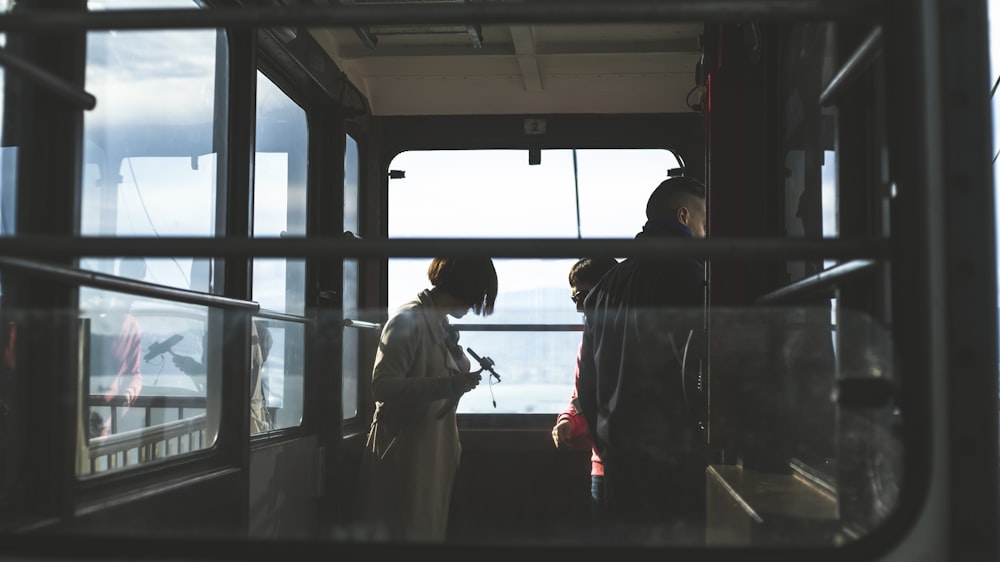 woman and man inside cable car