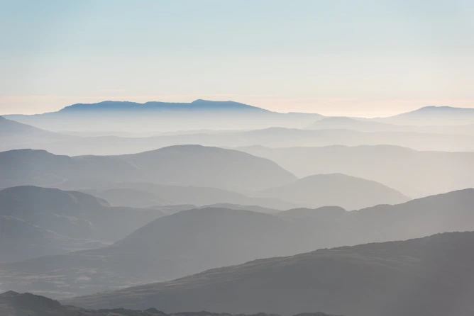 mountains cover by fogs