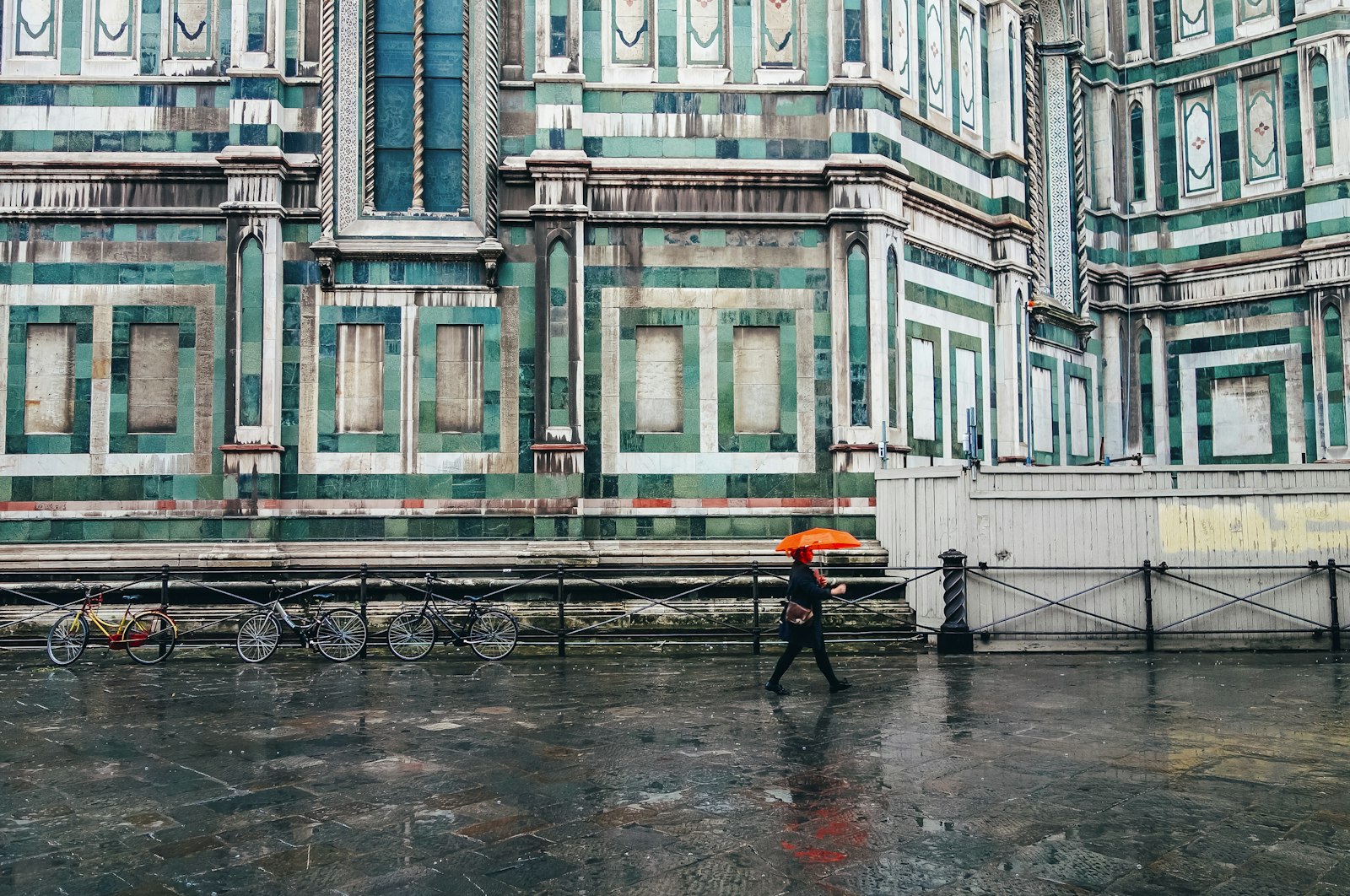 Sony Cyber-shot DSC-RX100 sample photo. Person holding umbrella walking photography