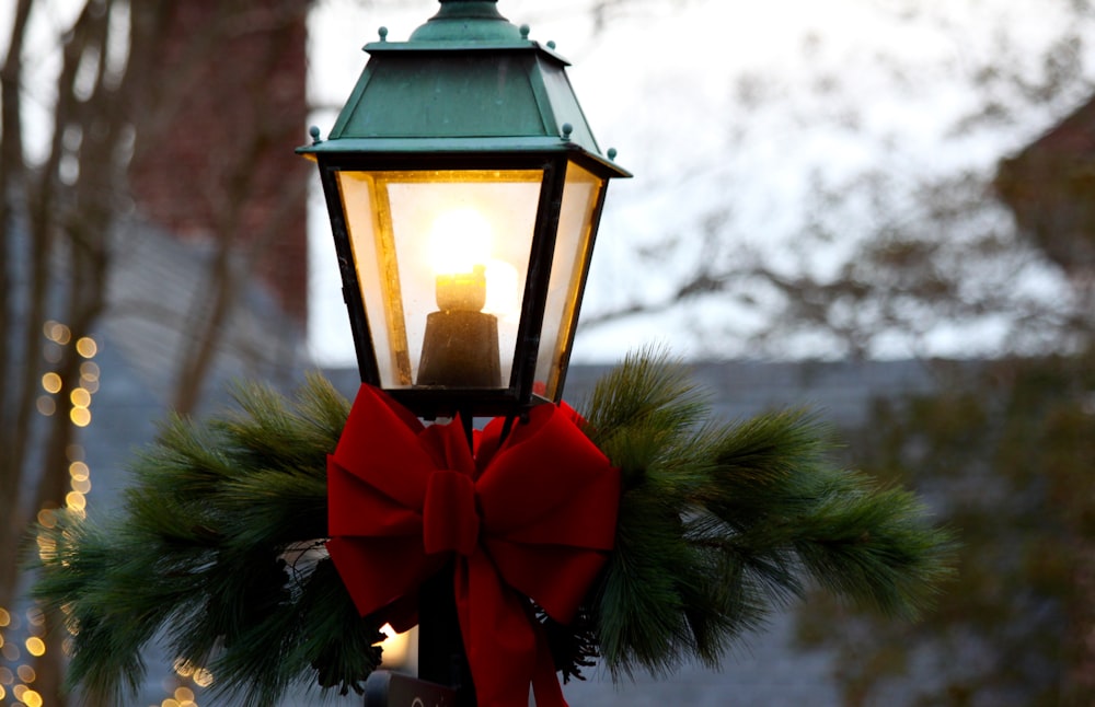 red and black metal lantern lighted