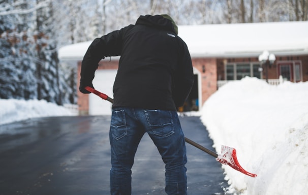 person shoveling snow