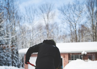 person shoveling snow