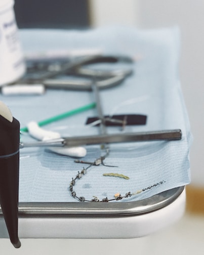 Close-up of dental tools neatly arranged on a clean tray.