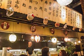 The cozy interior of hikarizumi with soft lighting and clean, simple decor.