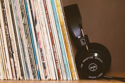 A sleek decibelvibe equalizer displayed alongside classic vinyl records.