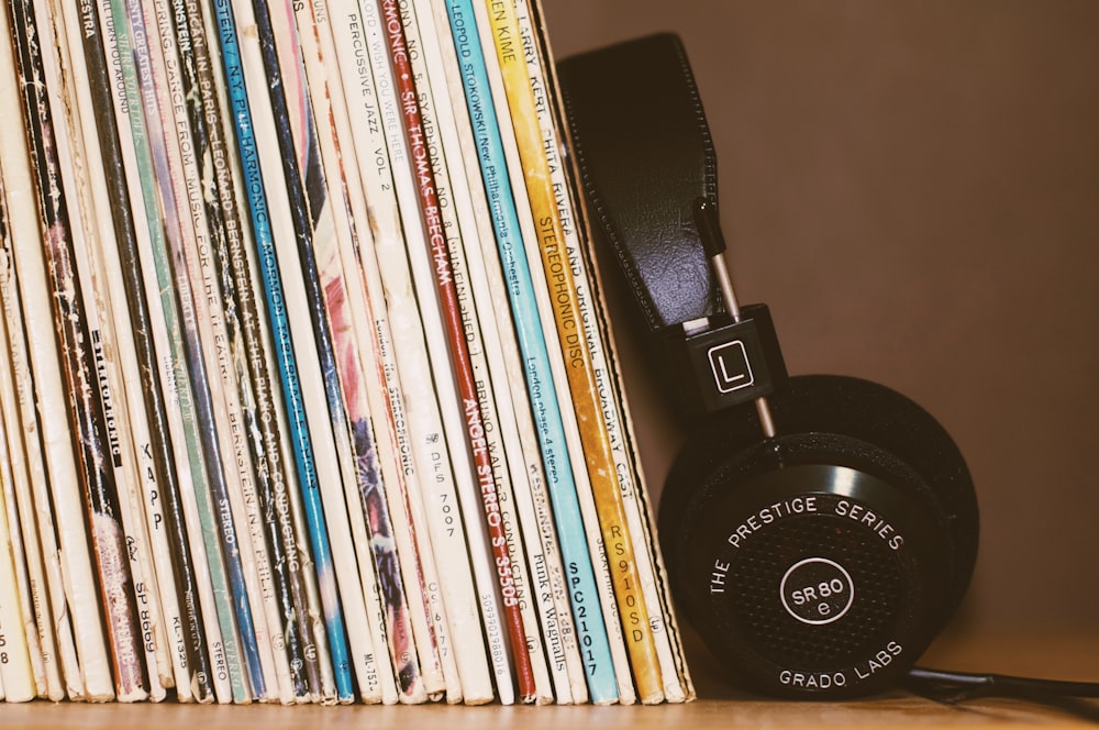 Black headphones against record collection of copyrighted music