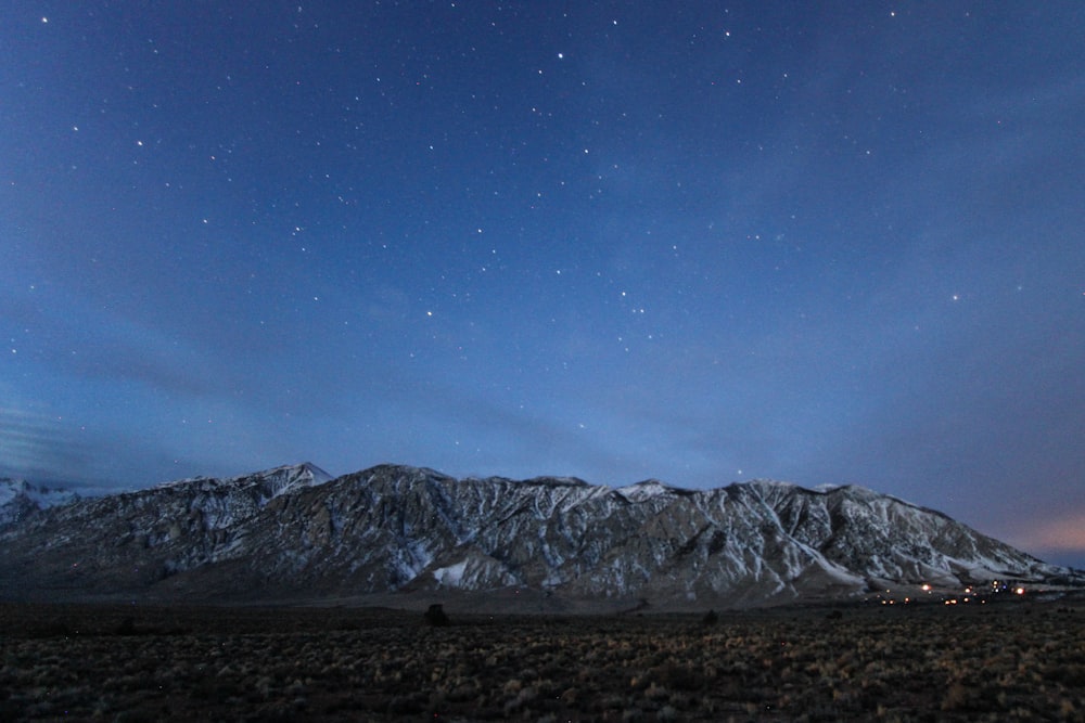 gray mountain under blue sky