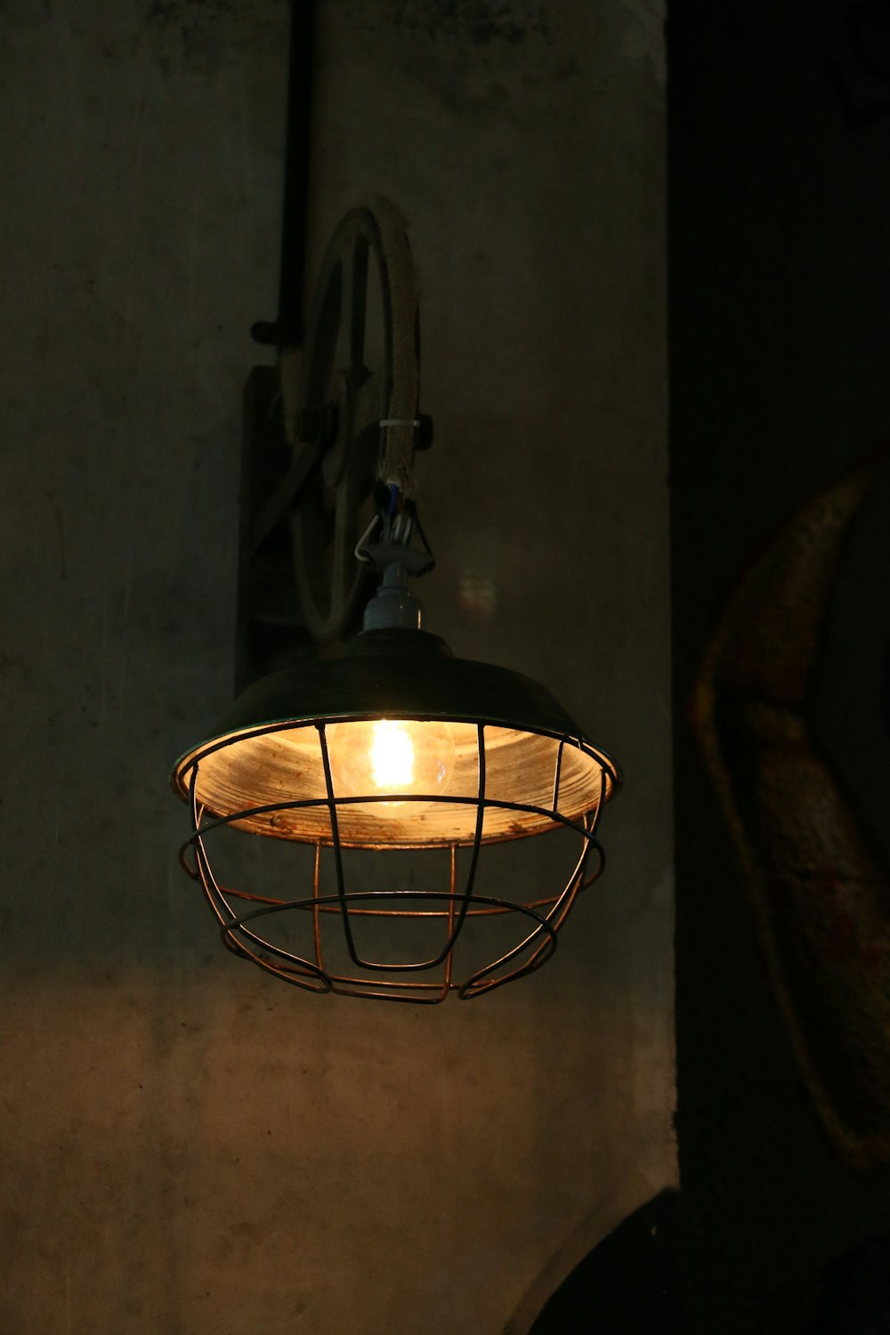 brown sconce with lights on