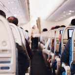 shallow focus photography of people inside of passenger plane