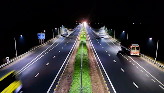 vehicles traveling on roads at night