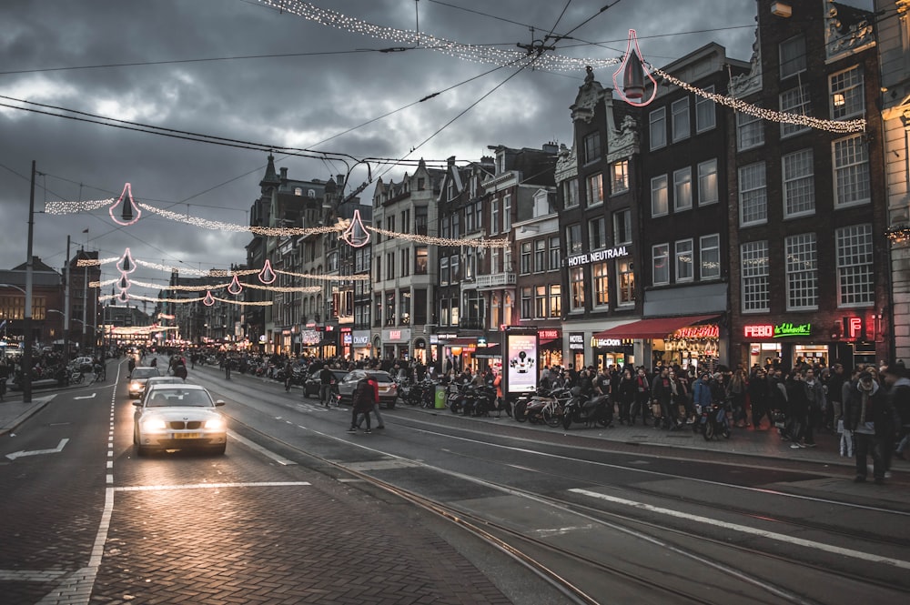 crowd of people walking on the street