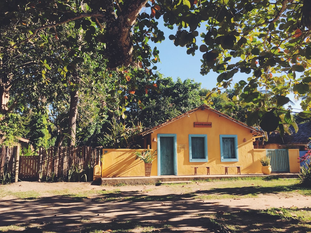 green and yellow cement house