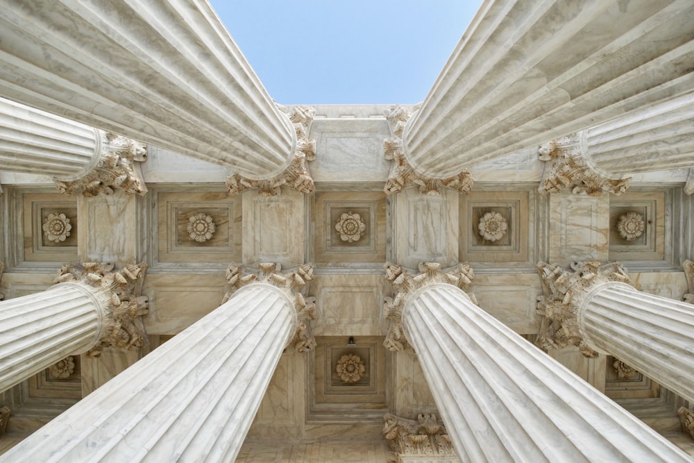 gray stone columns worm's-eye view photo