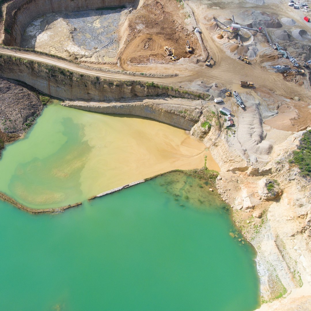 Mining quarry with special equipment, open pit excavation. Sand mine. View from above.