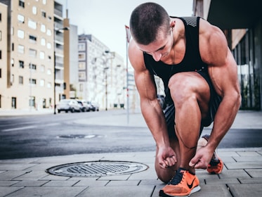 man tying his shoes