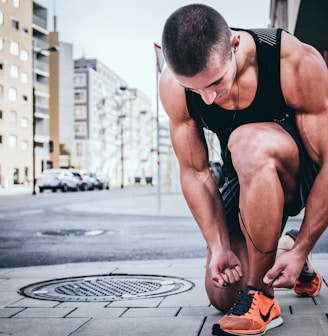 man tying his shoes