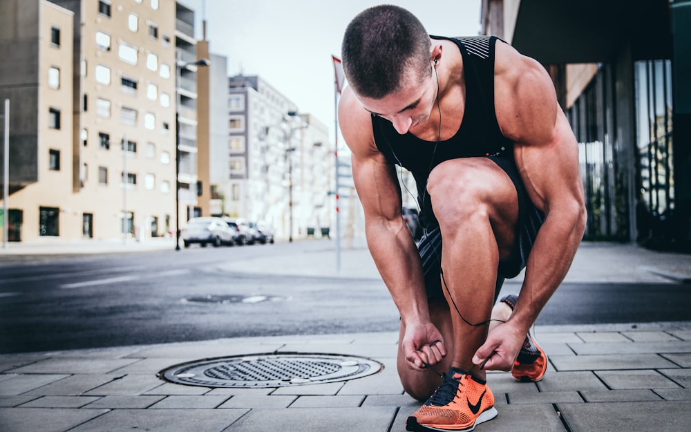 man tying his shoes