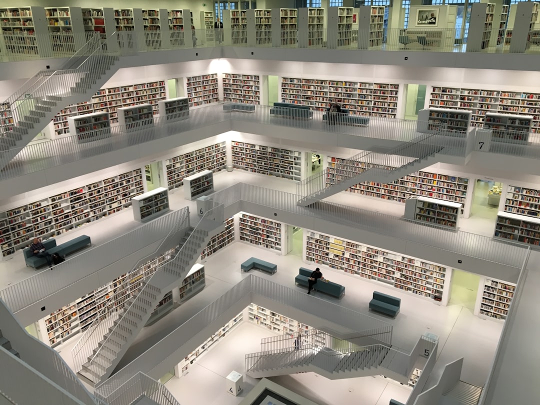 Designer modern library with staircases– SEO agency - Photo by Unsplash | best digital marketing - London, Bristol and Bath marketing agency