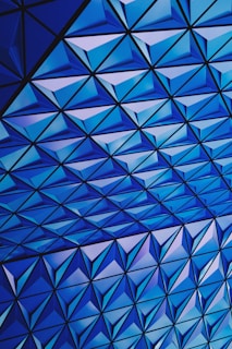 architectural photography of blue glass celing