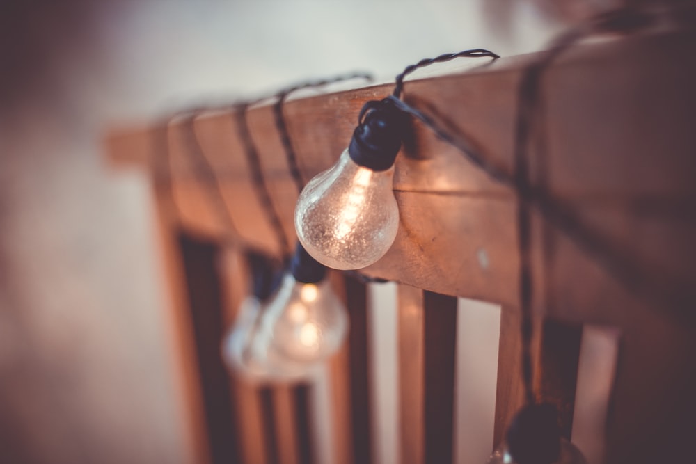 selective focus photography of string bulbs