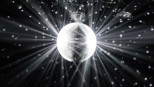 grayscale photography of disco ball