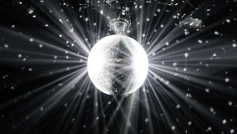 grayscale photography of disco ball
