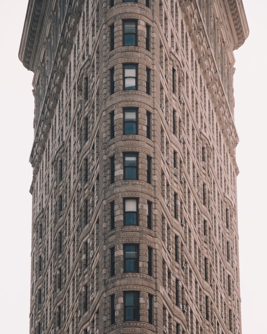 brown concrete building during daytome in Flatiron Building United States