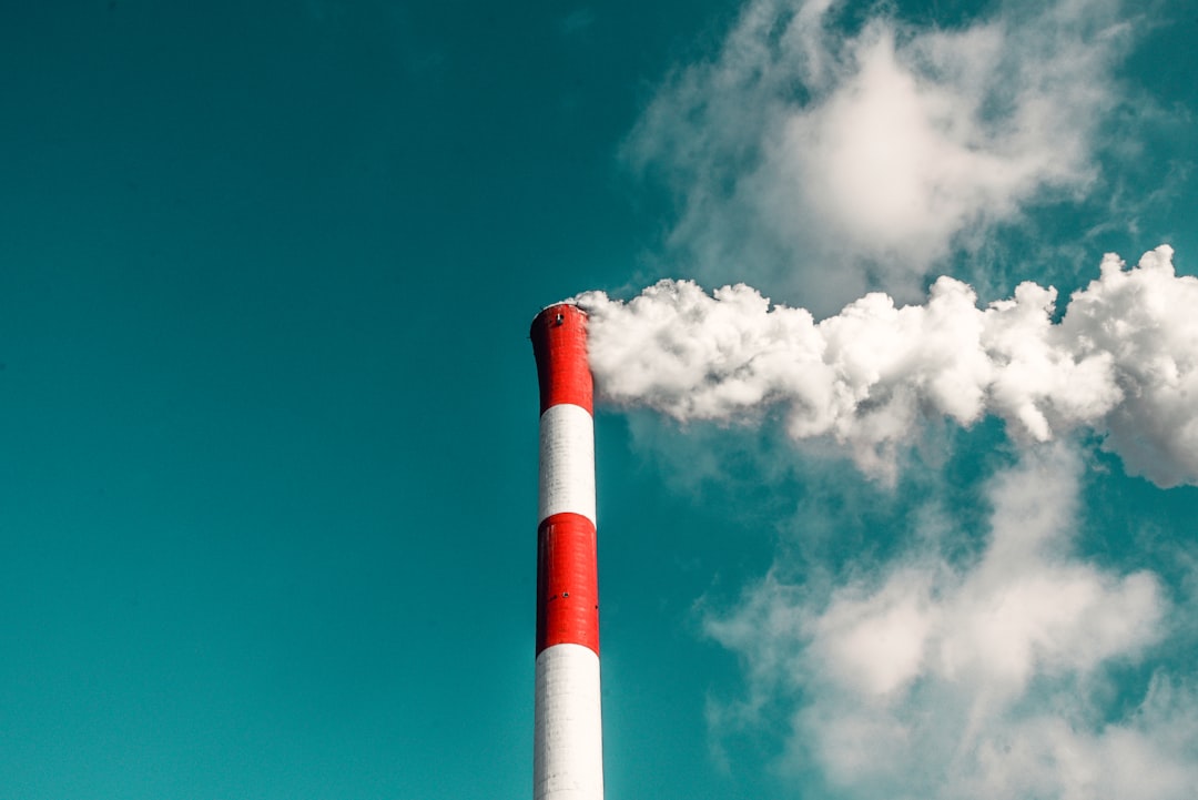  photography of white smoke chimney