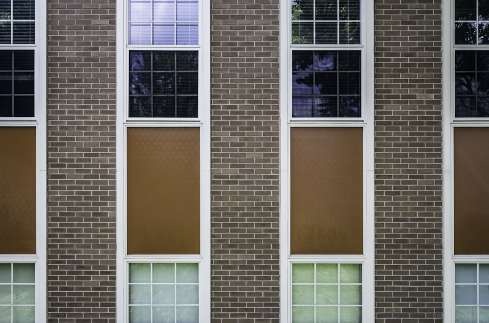 brown concrete building with closed windows