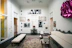 A beautifully decorated living room featuring vibrant wall art and cozy furniture.