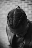 man showing braided hairstyle