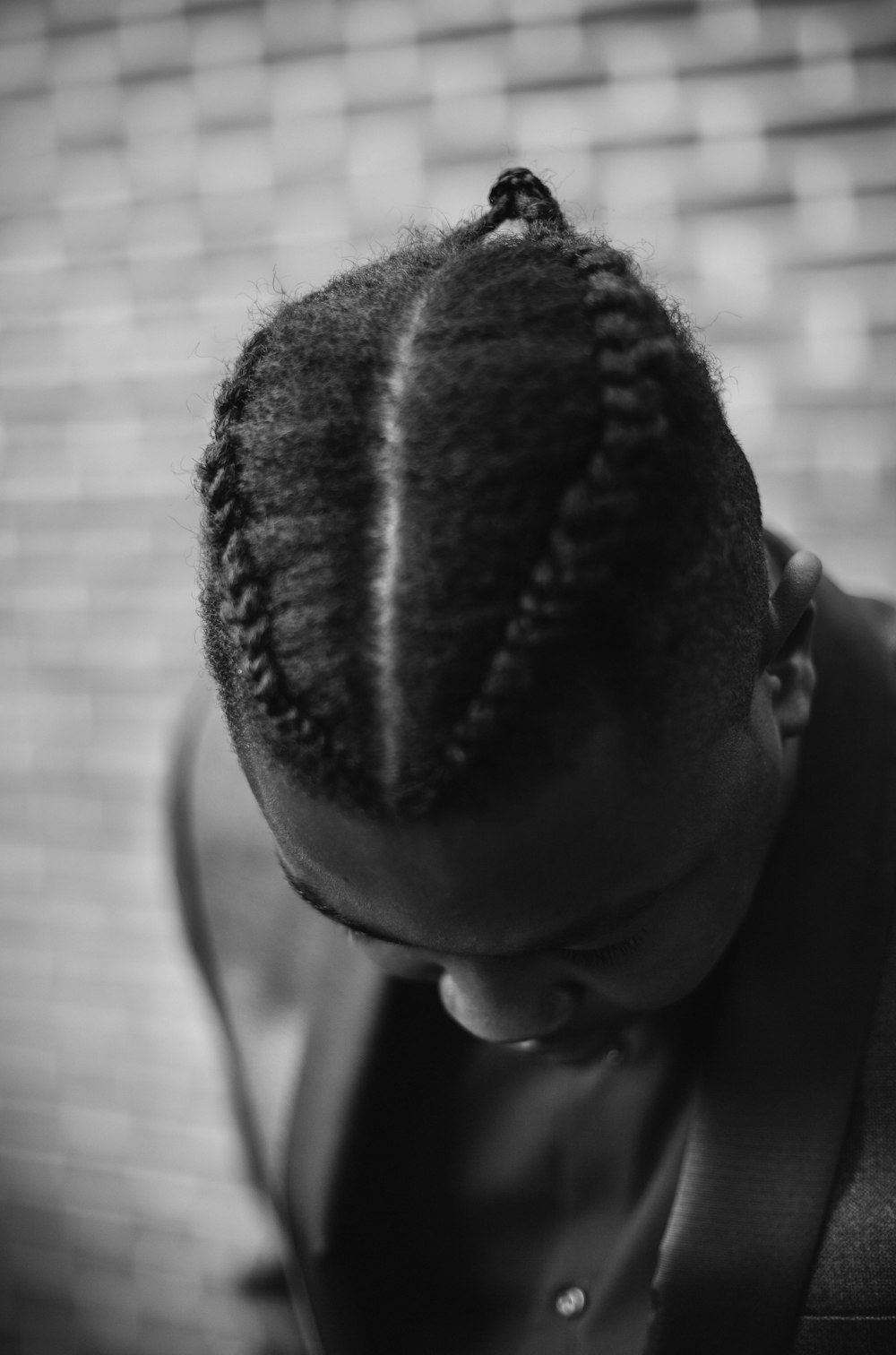 man showing braided hairstyle