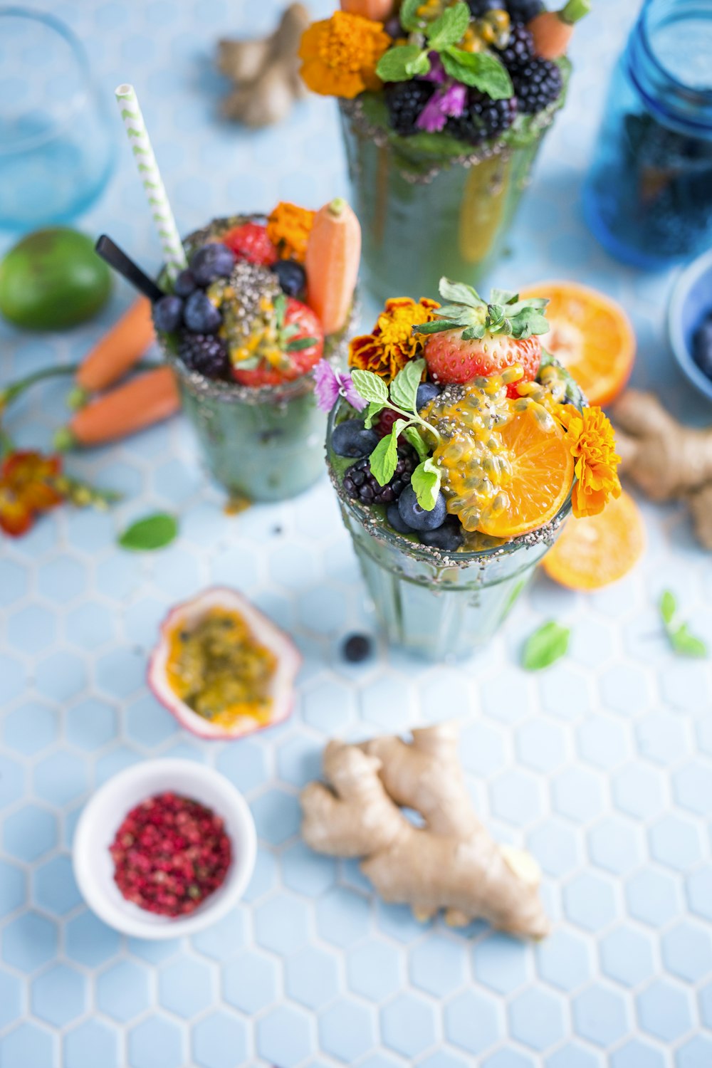 tilt shift lens photography of fruits in drinking glass