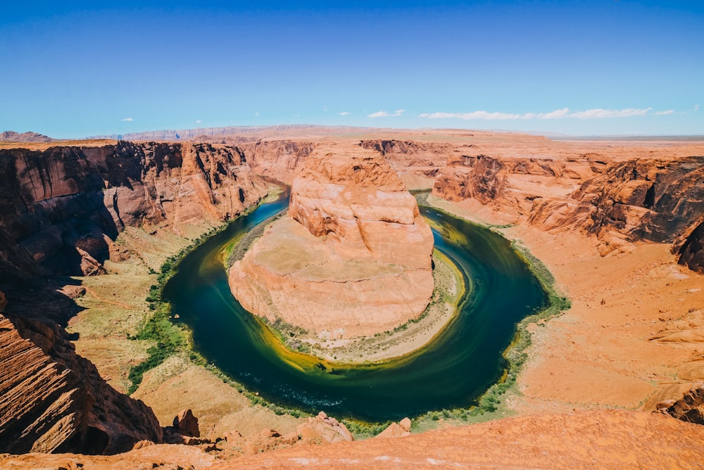 aerial photography of river and mountains