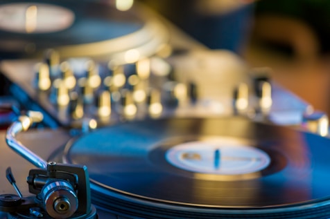 selective focus photography of black vinyl player