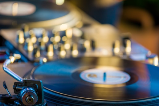selective focus photography of black vinyl player