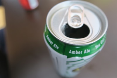 A close-up of a rare beer can featuring unique artwork.