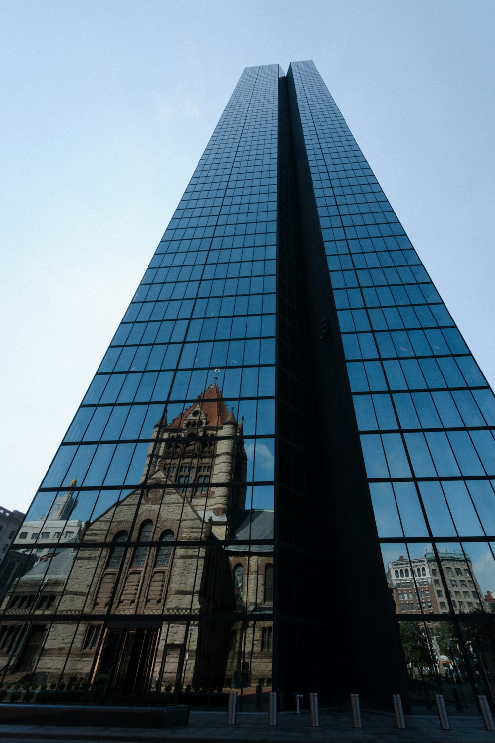 low angle photo of curtain glass wall building