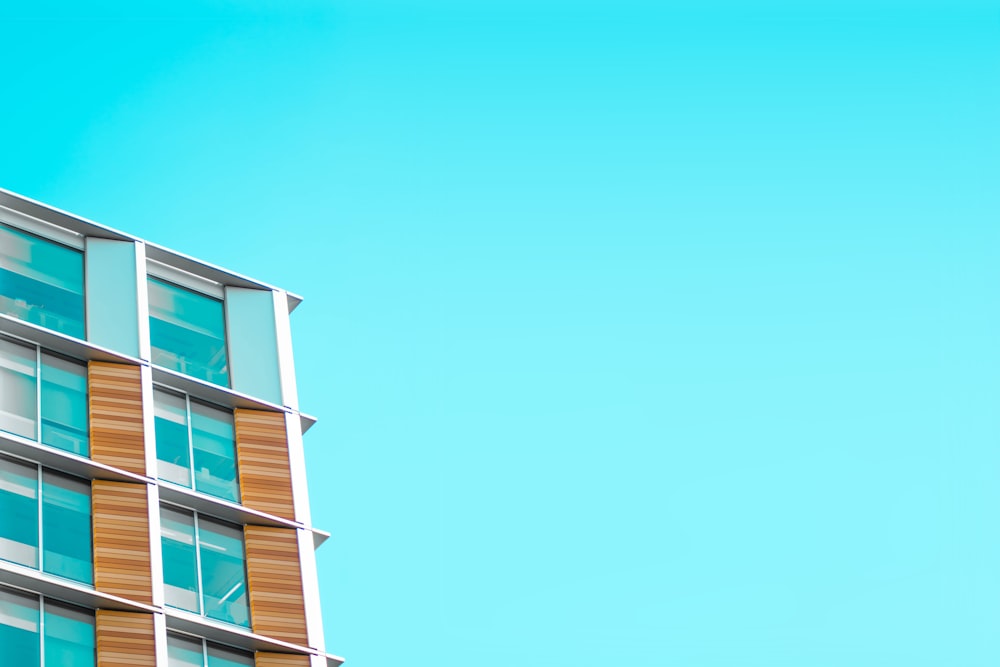 brown and clear glass high-rise building